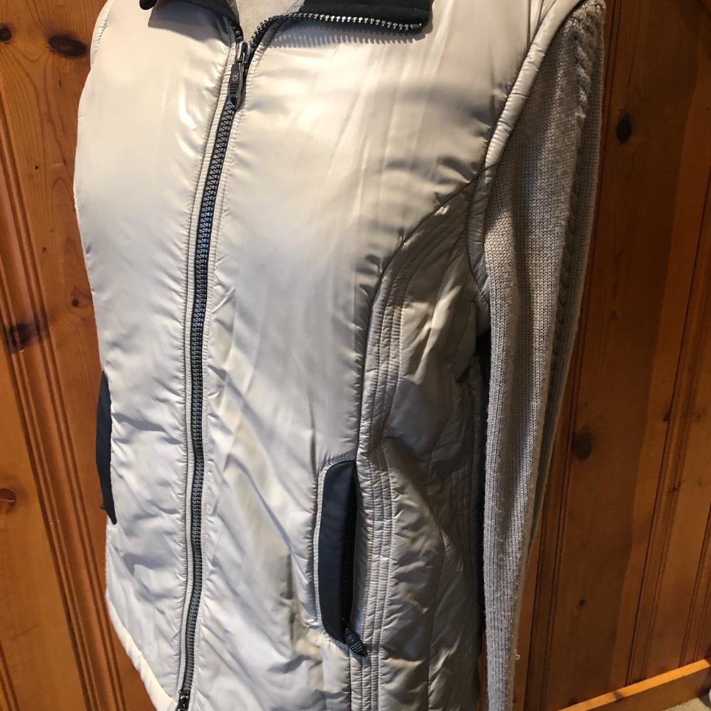 Lightweight jacket w sweater sleeves.